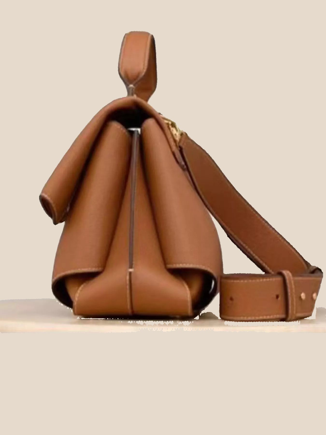 Caramel top handle crossbody bag side view