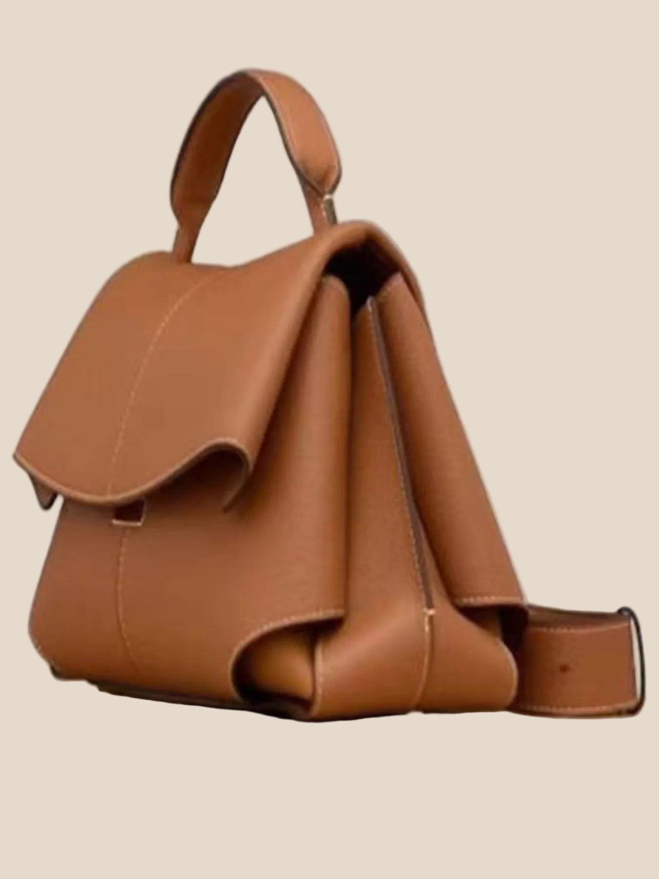 Caramel top handle crossbody bag side view