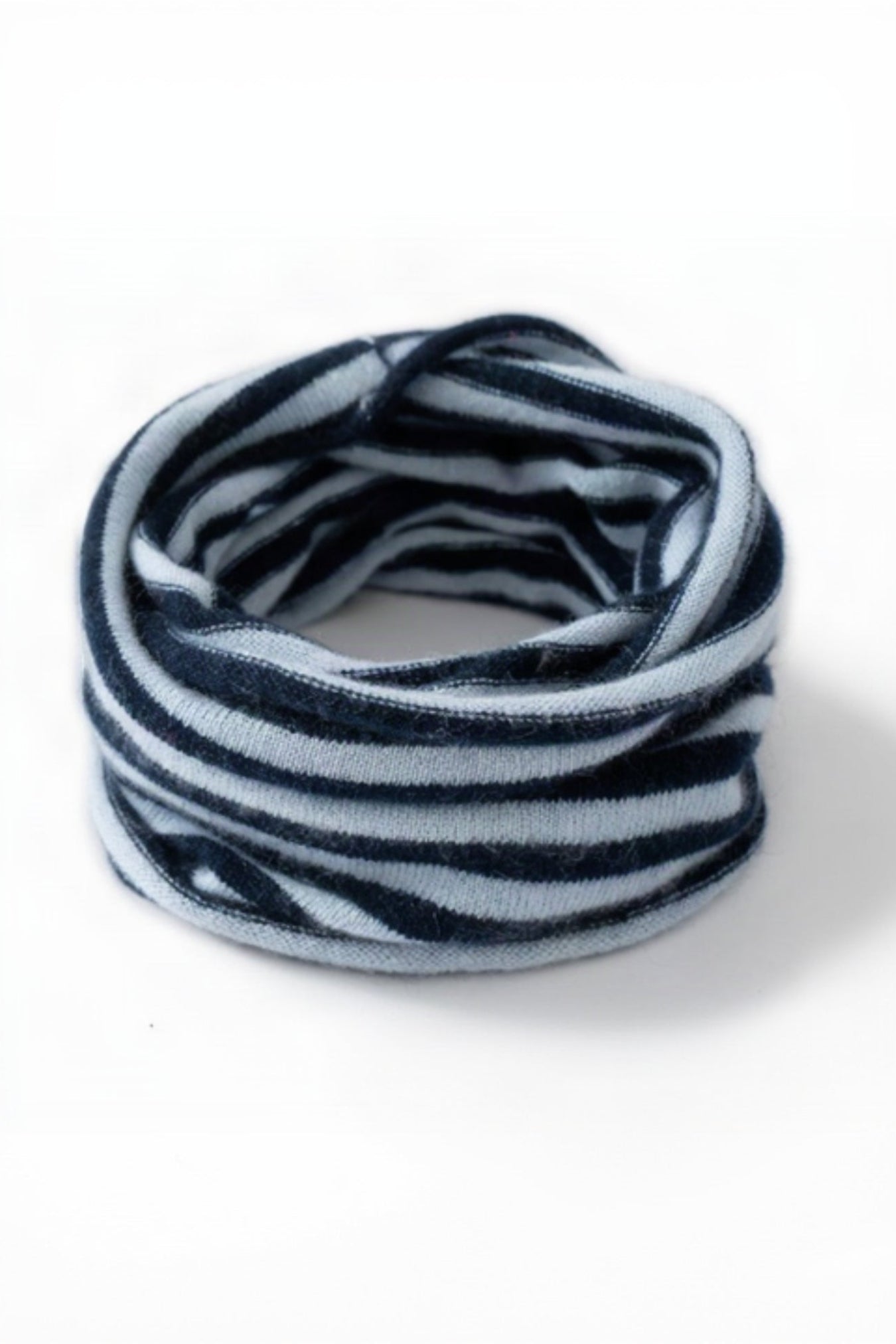 Zebra-striped neck warmer on a white background
