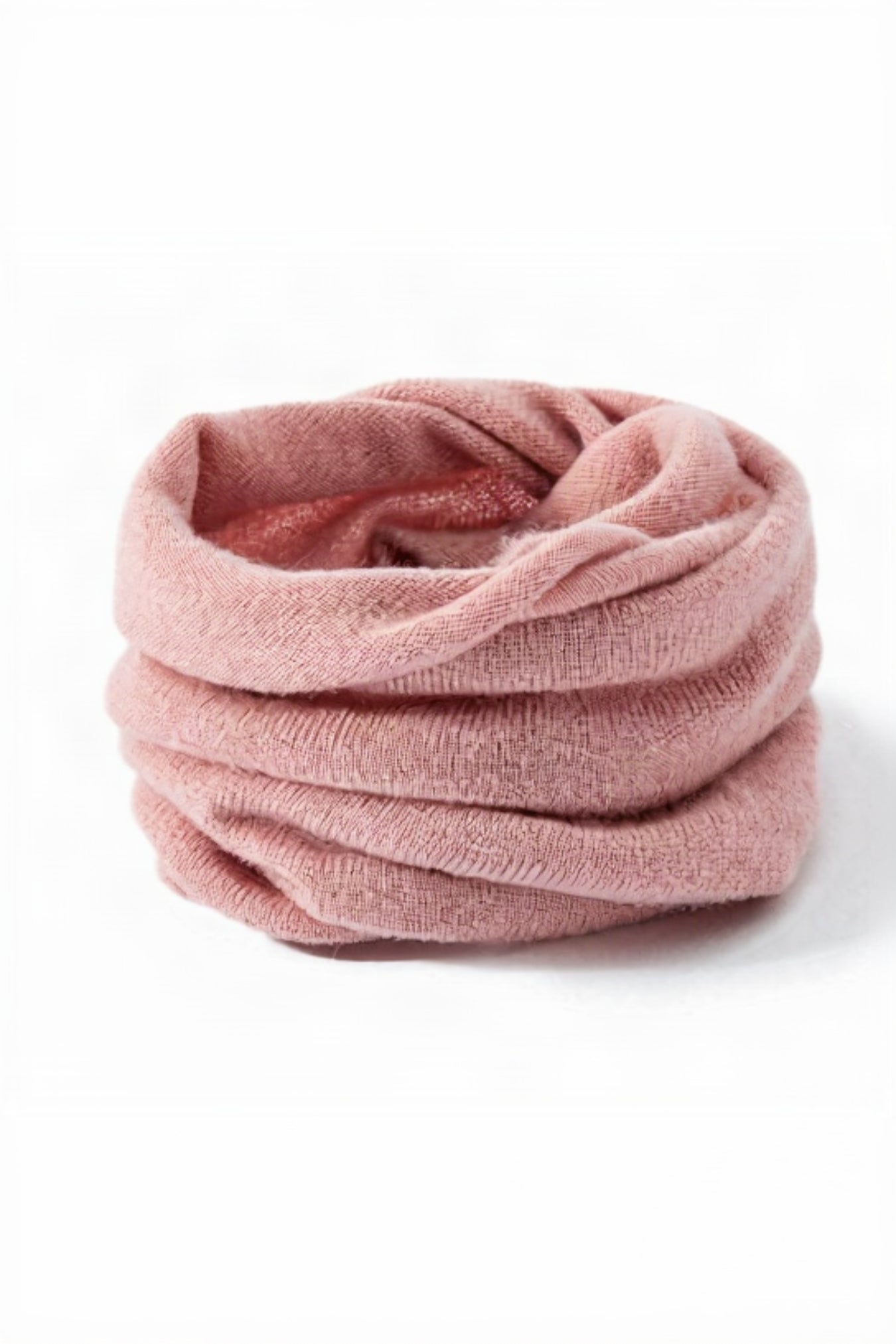 Pink knitted scarf on a white background