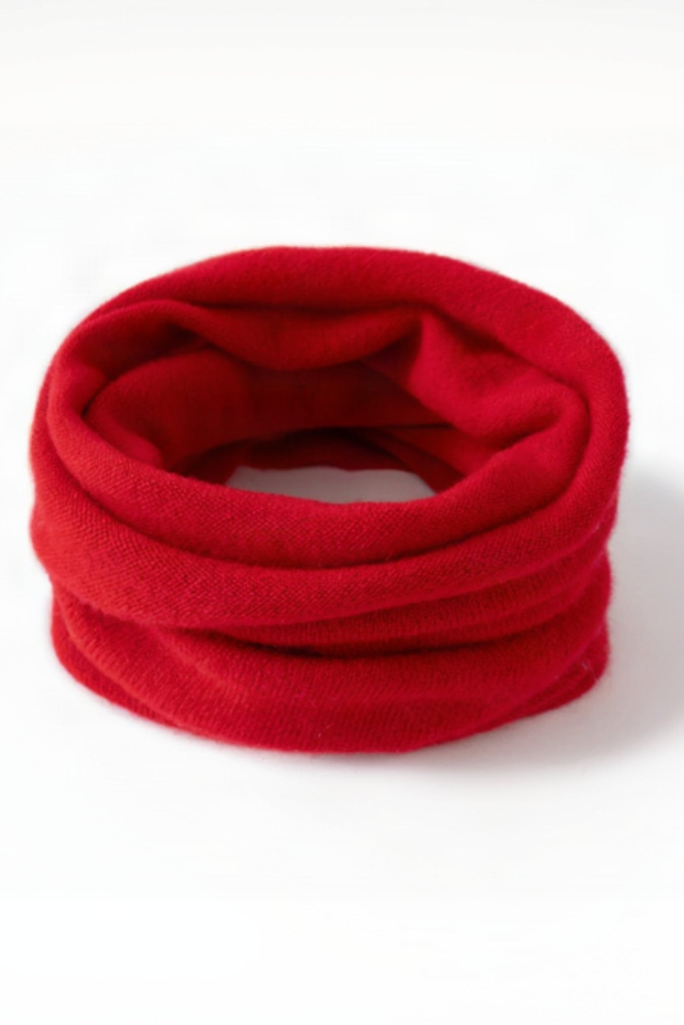 Red neck warmer on a white background