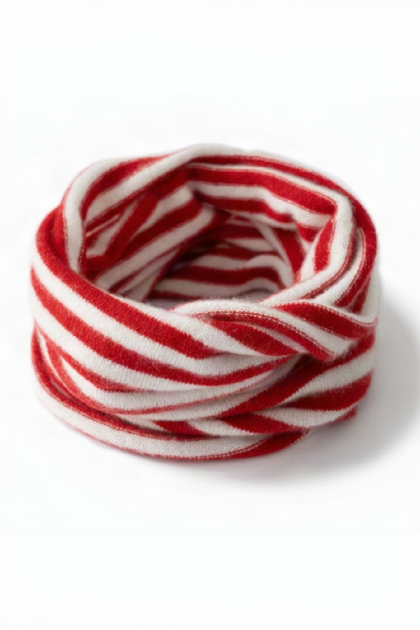 Red and white striped fabric on a white background