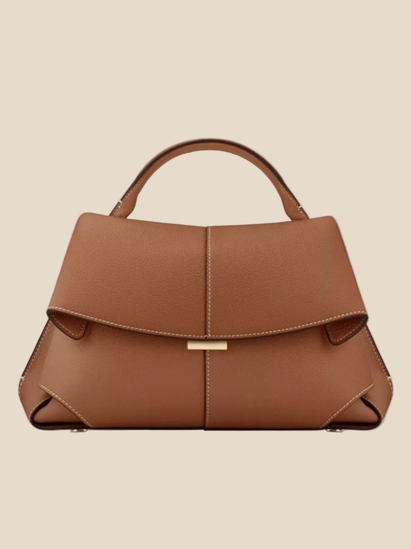 Brown handbag on a beige background