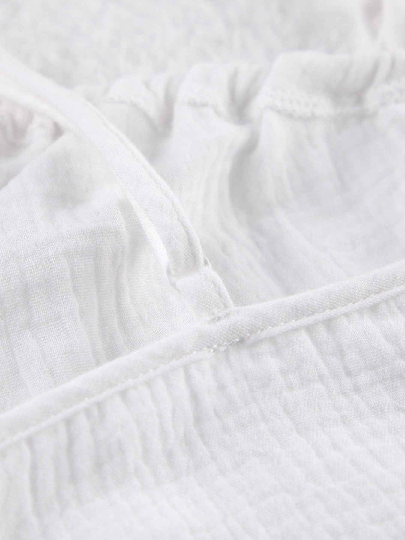 Close-up of white textured fabric