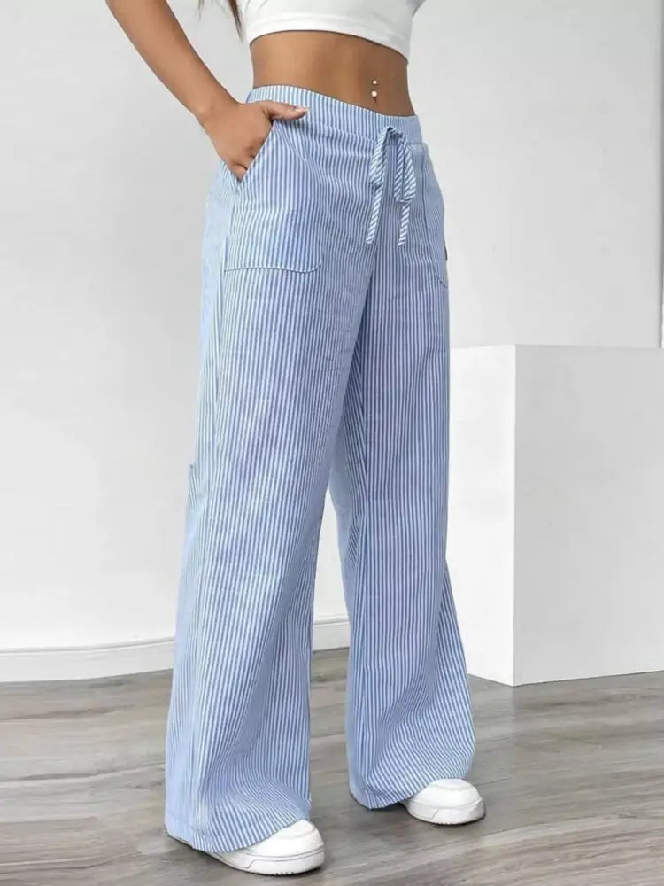 Light blue minimalist wide leg pants styling