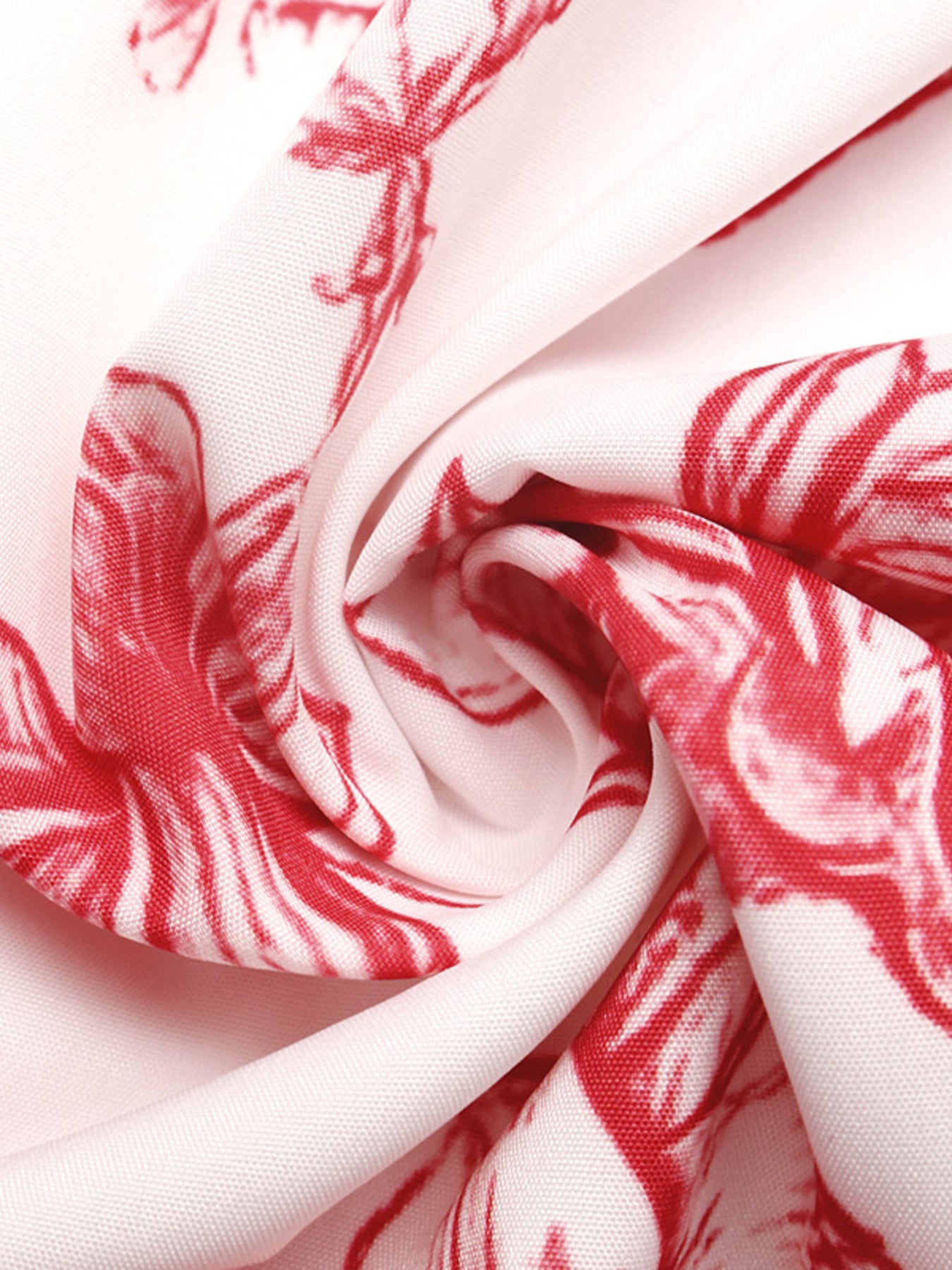 Close-up of red and white floral patterned fabric