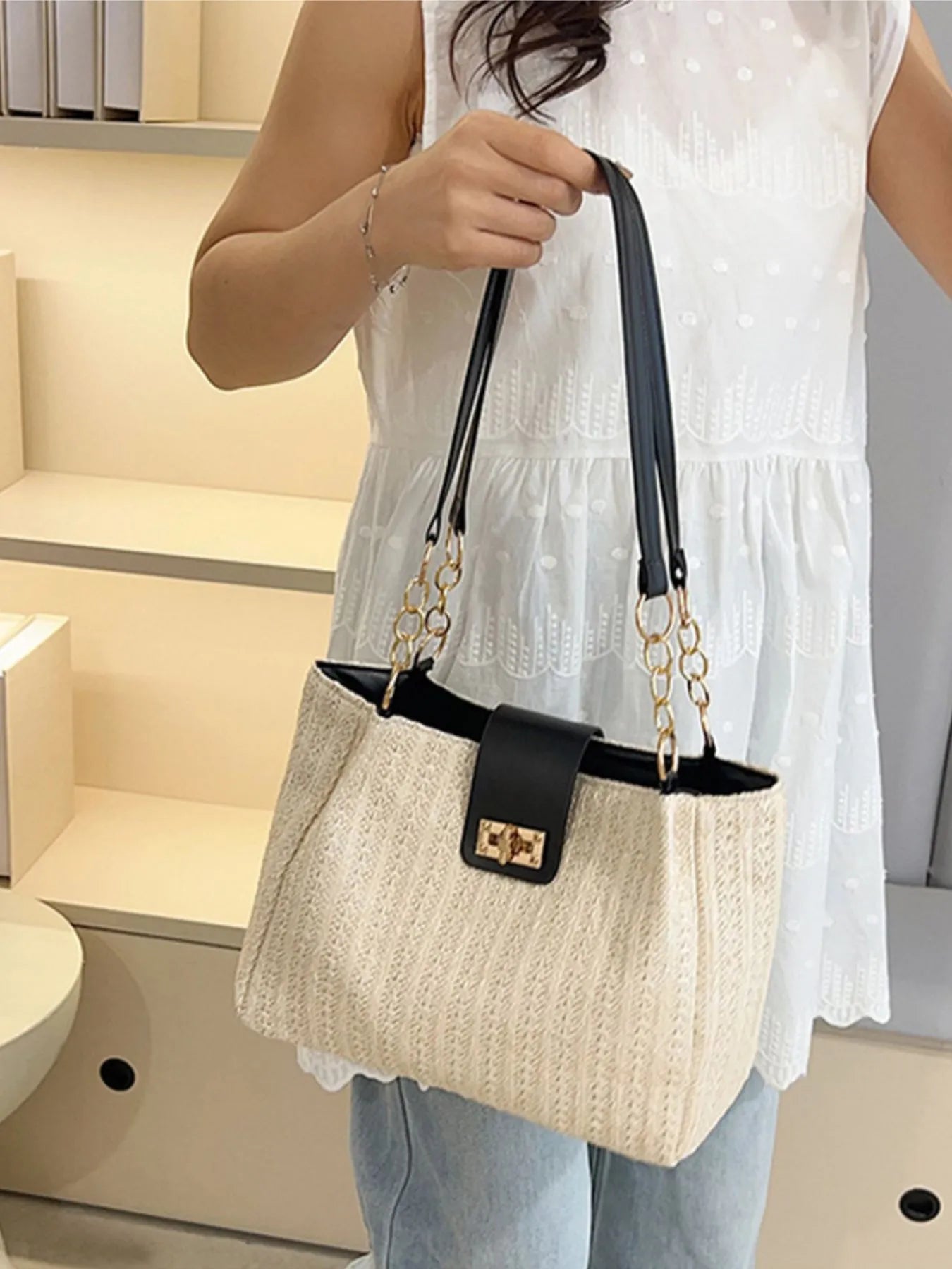 Woven straw bag worn with summer outfit