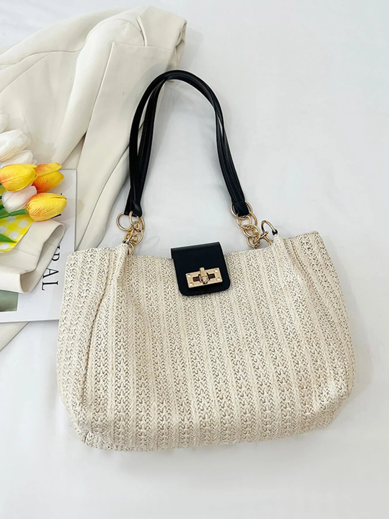 “Woven straw shoulder bag front view beige