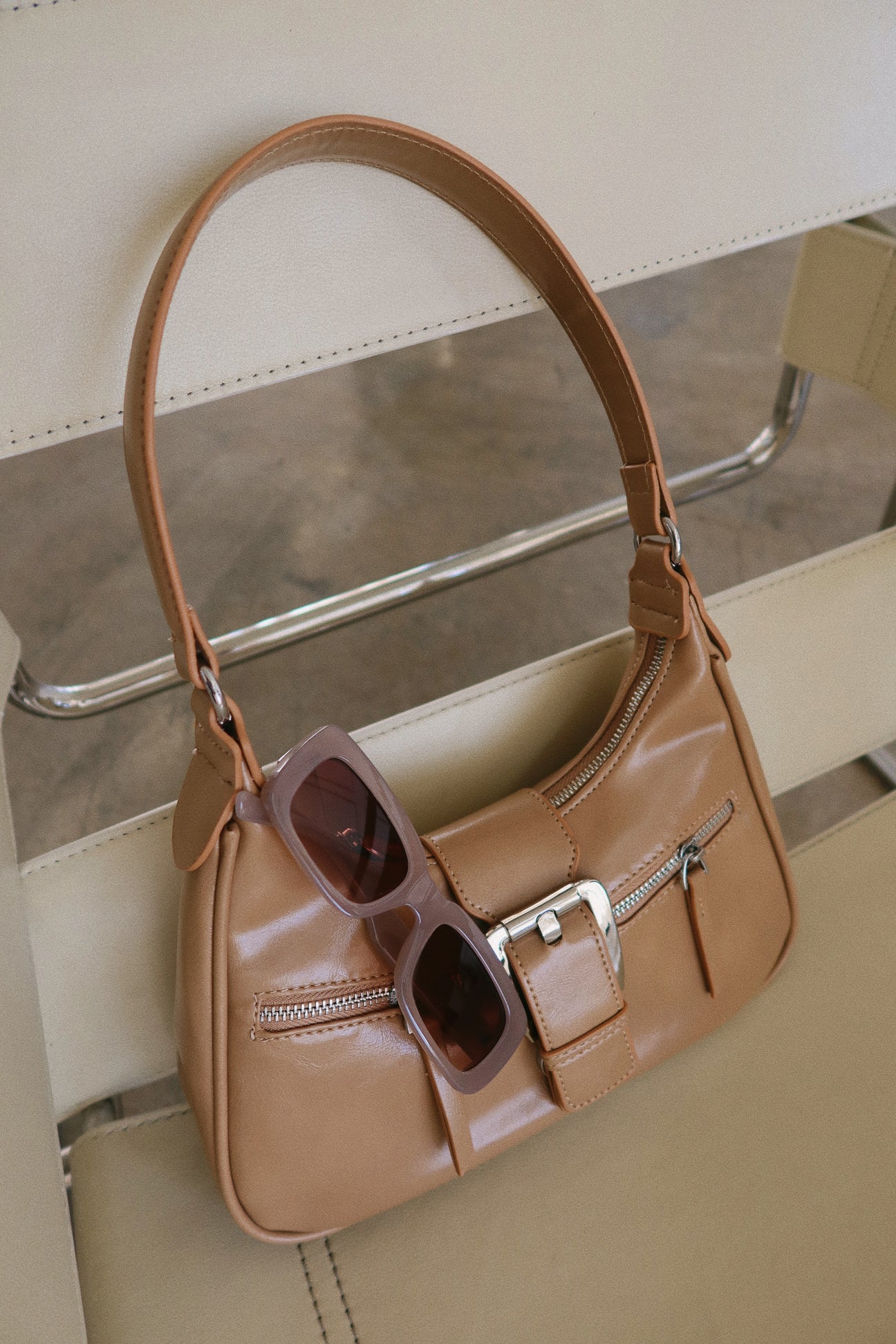 Tan patent leather Fame large buckle triple zipper shoulder bag