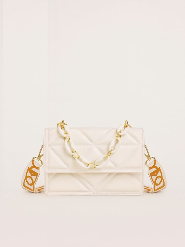 White quilted crossbody bag with gold chain and logo straps