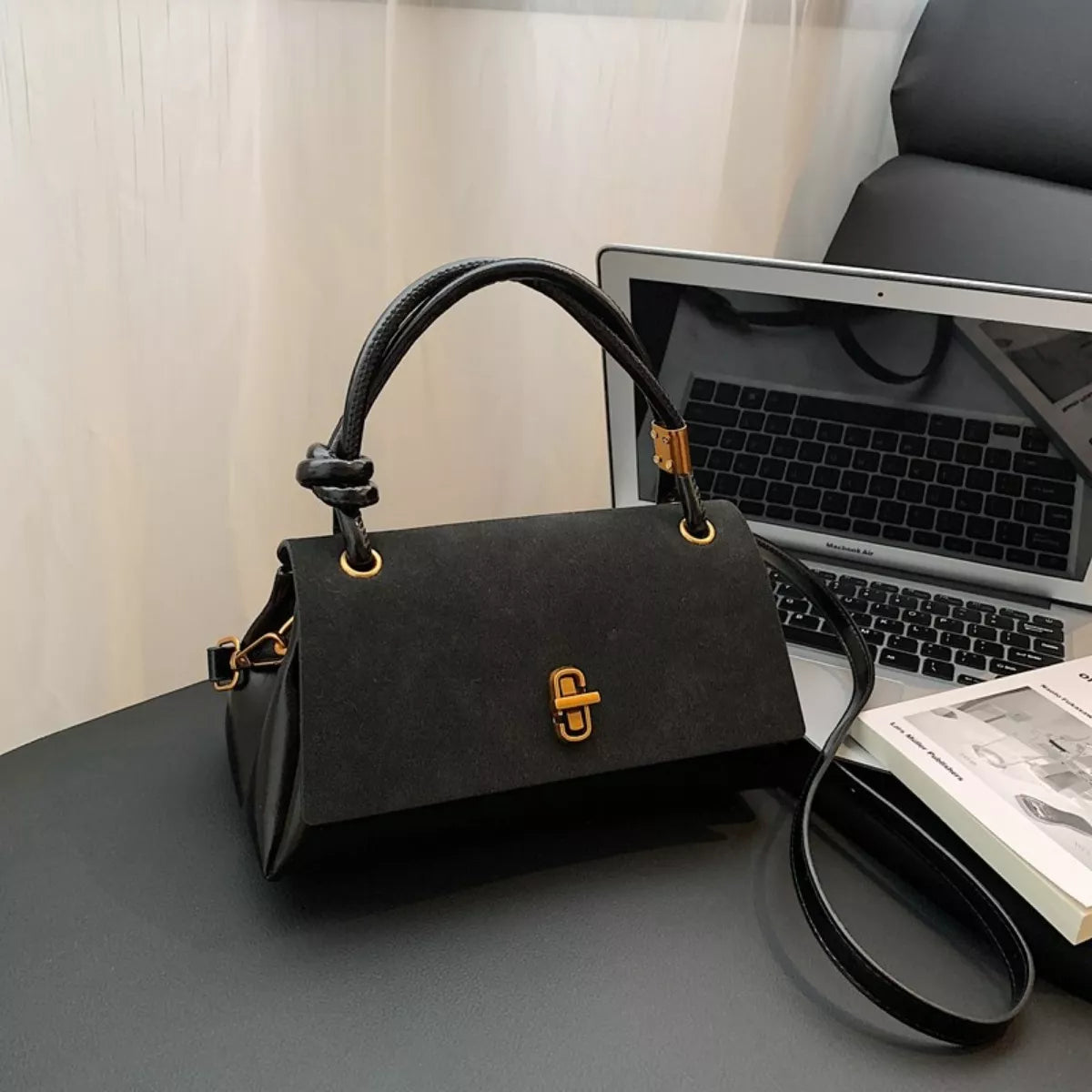 versatile crossbody and top handle bag