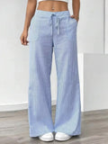 woman wearing high waist wide leg pants casual outfit
