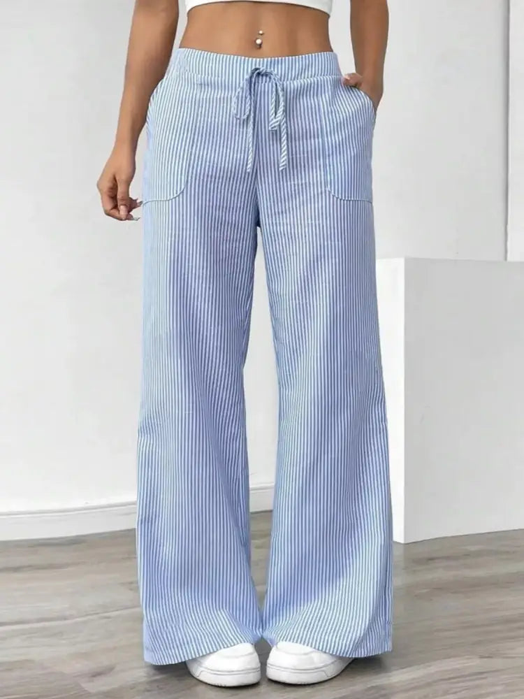 woman wearing high waist wide leg pants casual outfit